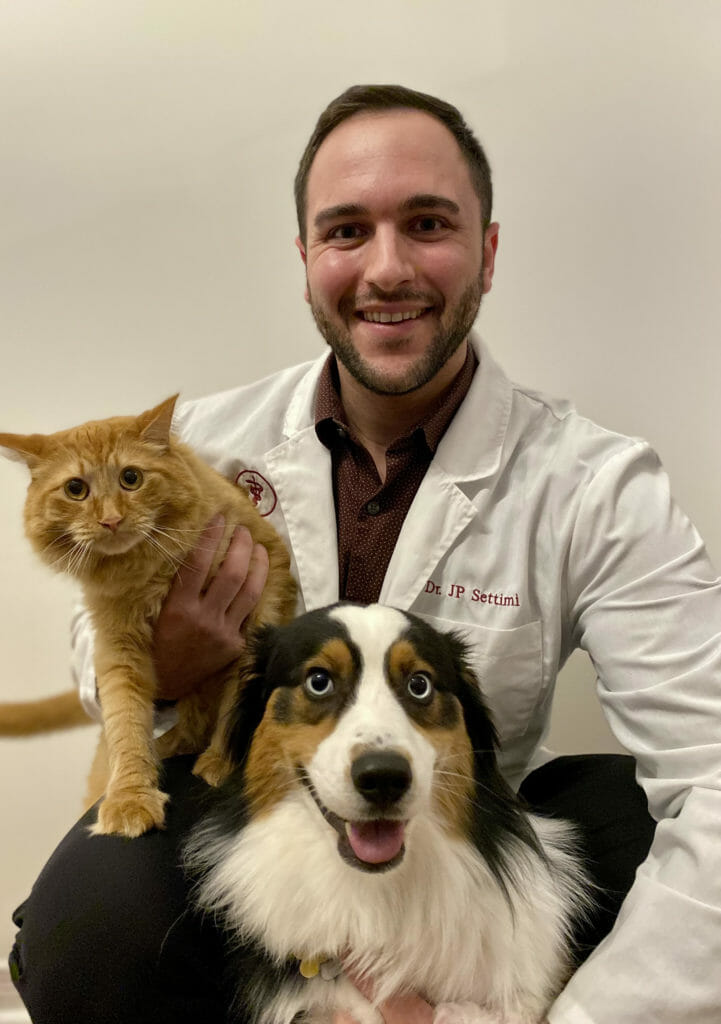 Dr. JP with cat and dog